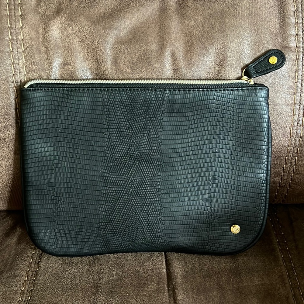 Stephanie Johnson zip black clutch. Like new.